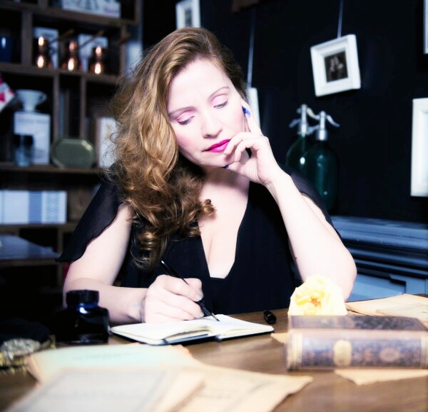 Julia Kalman, at the writers desk, at the Front Room, 2015. Photo by Dumitru Antonescu