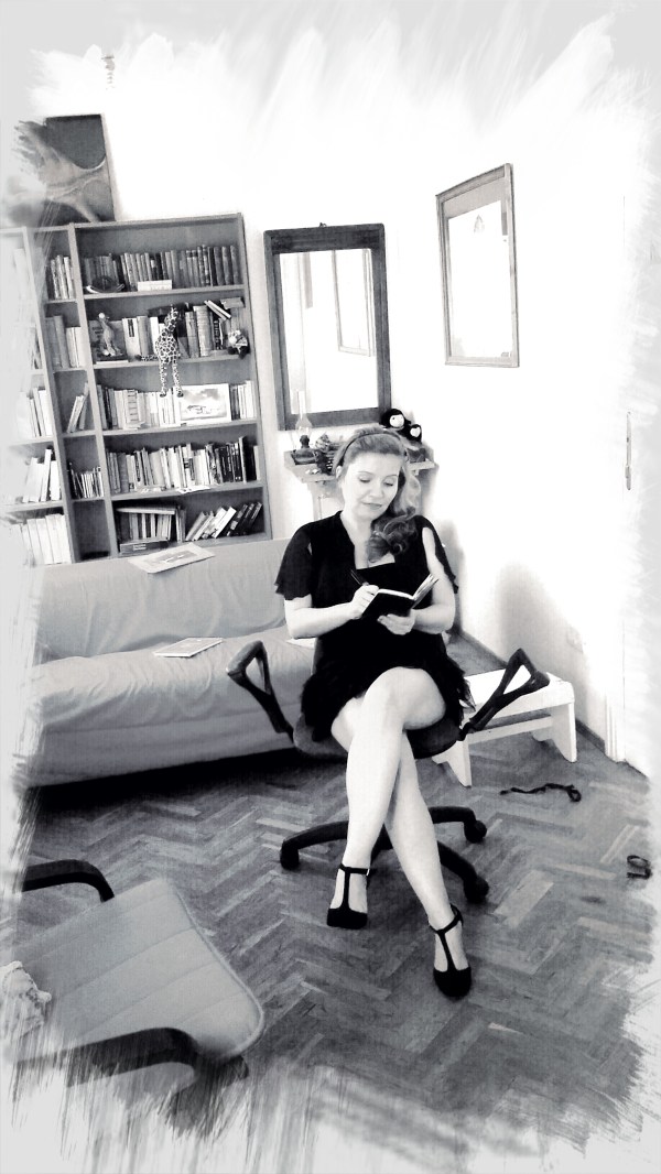 Julia Kalman writing in her studio.Photo by Alex